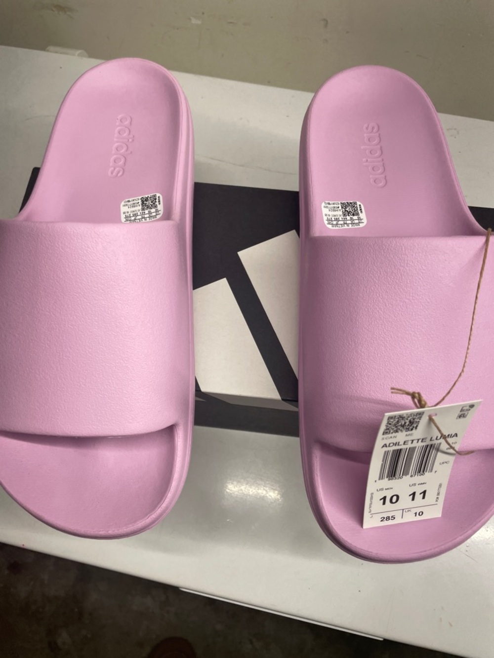 adidas Adilette Slides in Pastel Pink
